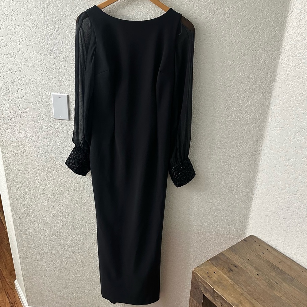 Rickie Freeman for Teri Jon long gown with sheer sleeves embellished cuffs.